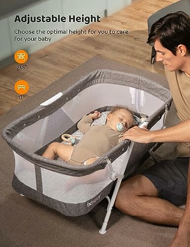 Man adjusting height of baby bassinet with sleeping infant.