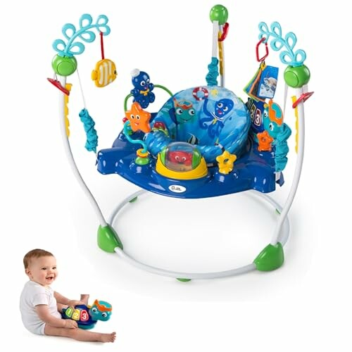 Colorful baby activity center with toys and a smiling baby.