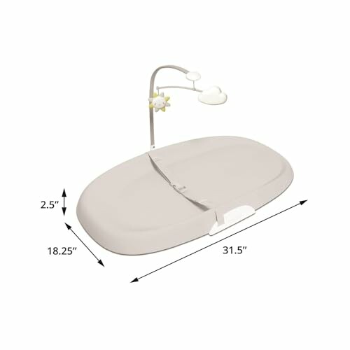 Baby changing table pad with adjustable strap and mobile holder.