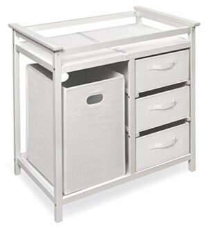 White baby changing table with storage bins and drawers.