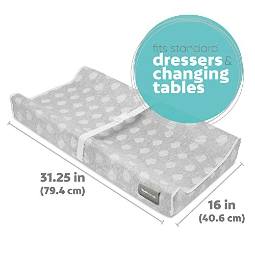 Changing pad with dimensions fits standard dressers and changing tables.