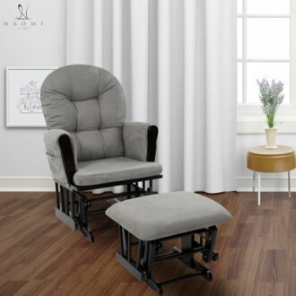 Gray glider chair with matching ottoman in a room with white curtains and wooden floor