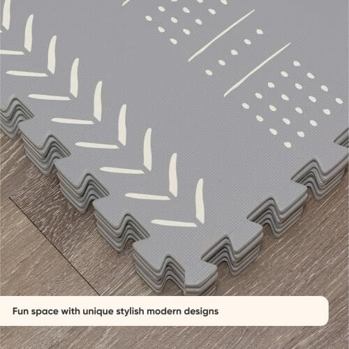 Interlocking floor mats with modern stylish designs on wooden floor.