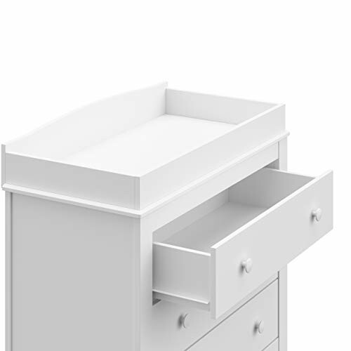 White baby changing table with open drawer