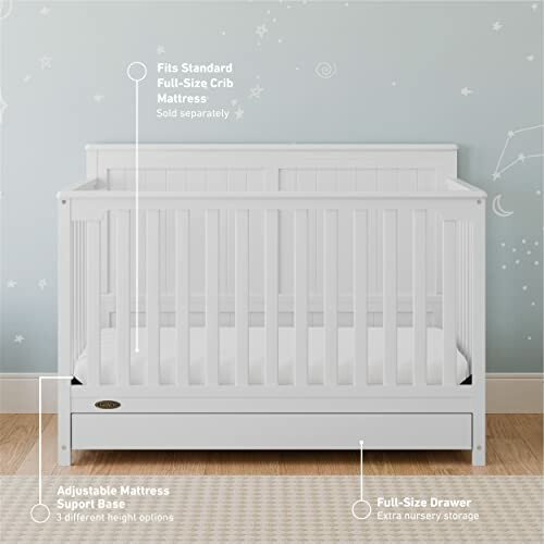 White baby crib with adjustable mattress and storage drawer.