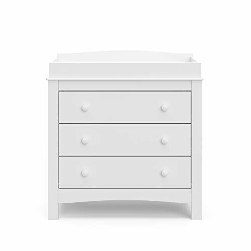 White dresser with three drawers and round knobs