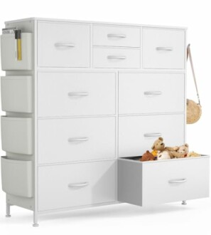 White storage cabinet with multiple drawers and a drawer open showing stuffed toys.